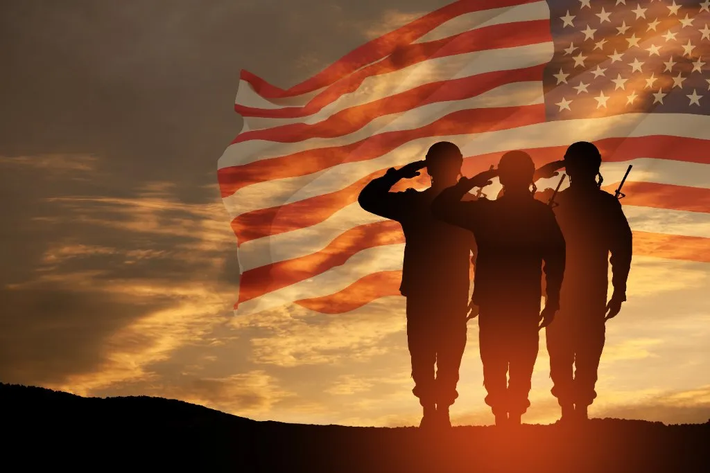Soldiers Saluting American Flag